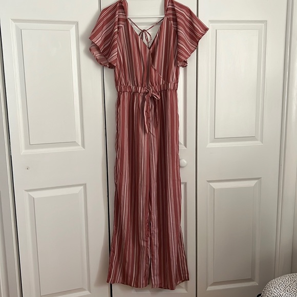 Mauve striped jumpsuit with flared/boot cut style. - Picture 1 of 1